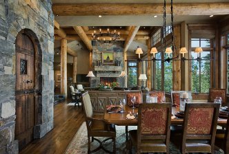 Interior, horizontal, dining room looking into living room with fireplace, Geisler residence, Big Sky, Montana, Reid Smith Architecture; Big Sky Build; Design Associates